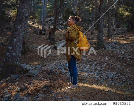 caucasian woman enjoys being in nature, caucasian woman enjoys being in nature, 98985831