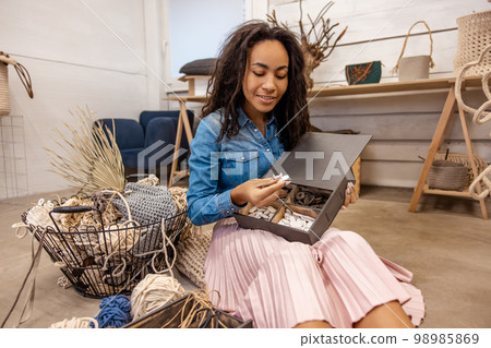Young african american woman looking enjoyed 98985869