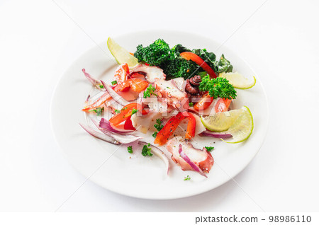 Octopus carpaccio on white background Octopus carpaccio on white background 98986110