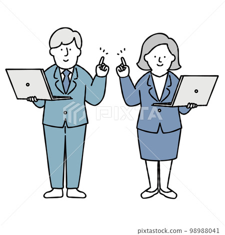 Male and female office workers holding a computer and pointing Blue 98988041