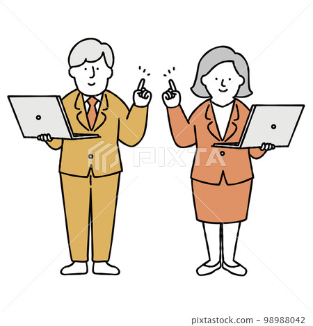 Male and female office workers holding a computer and pointing Yellow 98988042
