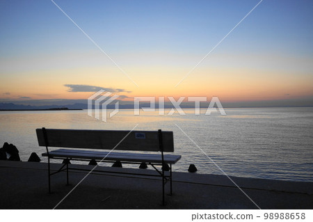 Matama beach sunset and benches Matama beach sunset and benches 98988658