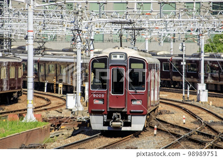 Hankyu Electric Railway 9000 series running near Osaka Umeda Station Hankyu Electric Railway 9000 series running near Osaka Umeda Station 98989751