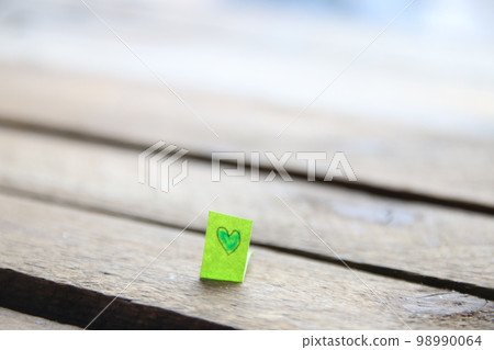 Heart on vintage background. Drawing on a tag. Happy birthday. Heart on vintage background. Drawing on a tag. Happy birthday. 98990064