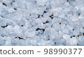 Crystals of food salt 98990377