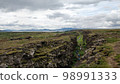 Top view of the geological fault and Thingvallavatn lake in the background at Thingvellir National Park, Iceland 98991333