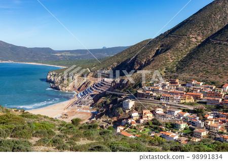 Town on the sea coast, Buggerru, Sardinia, Italy. Town on the sea coast, Buggerru, Sardinia, Italy. 98991834