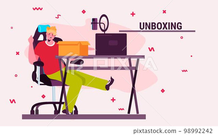 young guy blogger unboxing purchase streaming live social media network shopping blog generation Z lifestyle concept young guy blogger unboxing purchase streaming live social media network shopping blog generation Z lifestyle concept 98992242