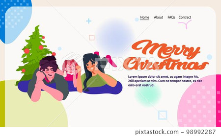 family haning fun near decorated fir tree happy new year merry christmas winter holidays celebration concept family haning fun near decorated fir tree happy new year merry christmas winter holidays celebration concept 98992287