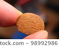 Acupuncture ring pinched with fingers 98992986