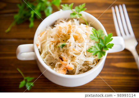 sauerkraut with carrots and spices in a bowl sauerkraut with carrots and spices in a bowl 98993114