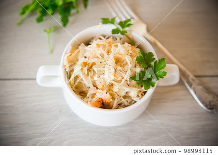 sauerkraut with carrots and spices in a bowl 98993115