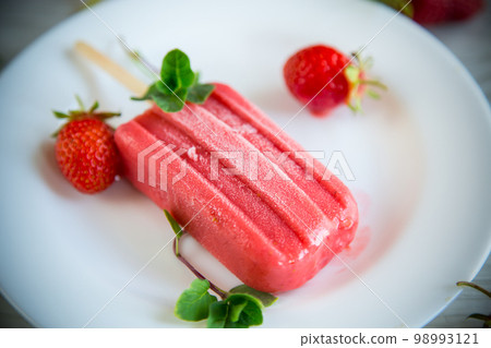 cooked homemade strawberry ice cream on a stick cooked homemade strawberry ice cream on a stick 98993121