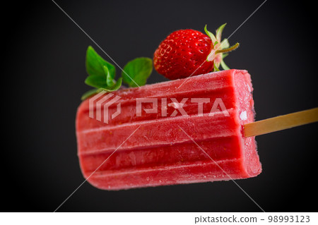 cooked homemade strawberry ice cream on a stick 98993123