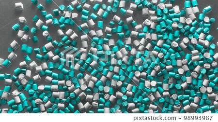 Close up picture of color masterbatch pellets, selective focus. Close up picture of color masterbatch pellets, selective focus. 98993987