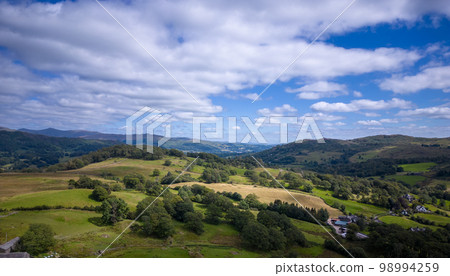 Wonderful Lake District National Park with its stunning landscape - aerial view Wonderful Lake District National Park with its stunning landscape - aerial view 98994259