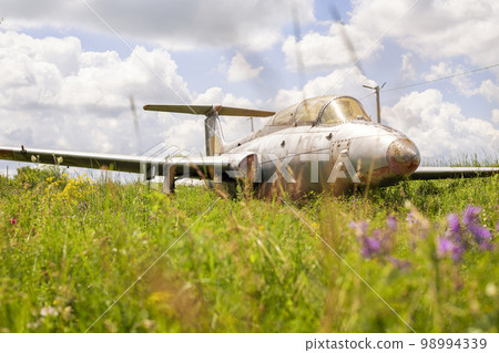 Old abandoned airfield with abandoned planes Old abandoned airfield with abandoned planes 98994339
