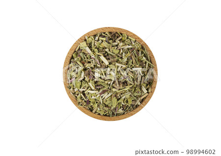 Catnip herb in latin - Nepeta cataria in wooden bowl isolated on white background. in wooden bowl isolated on white background. Medicinal herb. 98994602