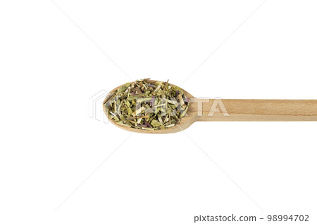 Catnip herb in latin - Nepeta cataria on wooden spoon isolated on white background. Medicinal herb. 98994702