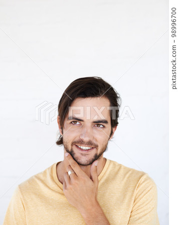 Idea, studio mockup and man thinking, pensive and focus on contemplating problem solving plan. Marketing space, advertising mock up and product placement for model isolated on white background wall 98996700