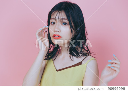 Photo of a young woman wearing cheap clothes Photo of a young woman wearing cheap clothes 98996996