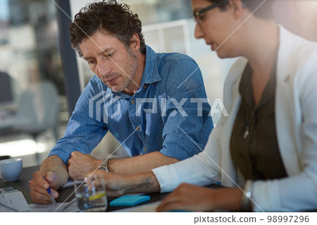 Team, business meeting and planning analysis or writing report note, web research innovation or tech partnership conversation. Diversity, teamwork and strategy analytics with documents in office 98997296