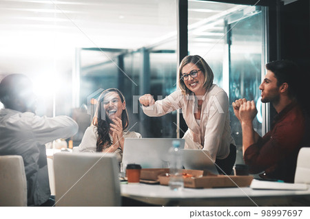 Fist bump, data analysis or business people in success business meeting, invest strategy or planning company finance.Celebrating, happy or teamwork on tax data analysis or global financial network Fist bump, data analysis or business people in success business meeting, invest strategy or planning company finance.Celebrating, happy or teamwork on tax data analysis or global financial network 98997697