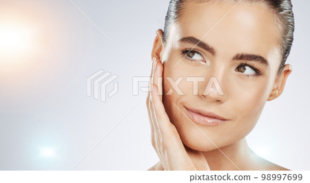 Skincare, thinking and face of a woman with beauty isolated on a grey studio background. Flare, dermatology and young healthy model with facial wellness, collagen and body detox on mockup backdrop Skincare, thinking and face of a woman with beauty isolated on a grey studio background. Flare, dermatology and young healthy model with facial wellness, collagen and body detox on mockup backdrop 98997699