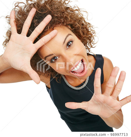 Shock, excited and portrait of a woman in a studio with a screaming, shouting and wow facial expression. Surprise, happy and female model from Mexico with omg or wtf face isolated by white background Shock, excited and portrait of a woman in a studio with a screaming, shouting and wow facial expression. Surprise, happy and female model from Mexico with omg or wtf face isolated by white background 98997713