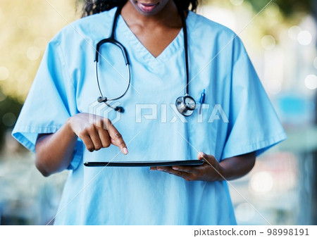 Doctor hands, tablet technology and medical research, healthcare software and hospital management app. Nurse black woman or expert person on digital tech services for clinic data analysis or results Doctor hands, tablet technology and medical research, healthcare software and hospital management app. Nurse black woman or expert person on digital tech services for clinic data analysis or results 98998191