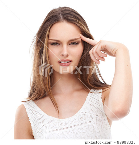 Portrait, thinking and pointing with a model woman in studio isolated on a white background for marketing. Face, idea and point with an attractive young female on black space for advertising 98998323