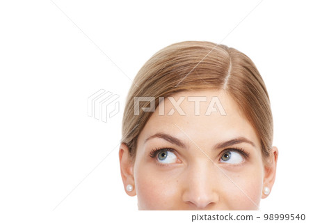 Woman, half face and thinking of vision in studio, mockup faq space or white background. Planning, decision and choice of female model for ideas, inspiration or remember solution, memory or mind goal Woman, half face and thinking of vision in studio, mockup faq space or white background. Planning, decision and choice of female model for ideas, inspiration or remember solution, memory or mind goal 98999540