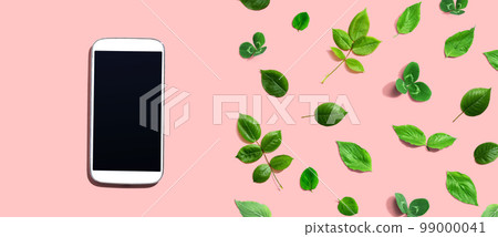 White smartphone with green leaves 99000041