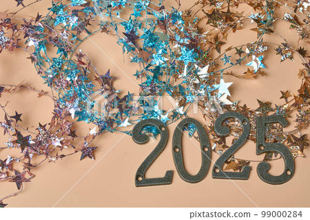 2025 letters and glitter background 2025 letters and glitter background 99000284