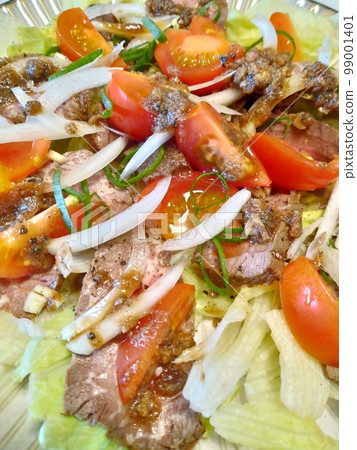 Roast beef and tomatoes, my wife's homemade home cooking, dinner at home, happy family, enjoying corona Roast beef and tomatoes, my wife's homemade home cooking, dinner at home, happy family, enjoying corona 99001401