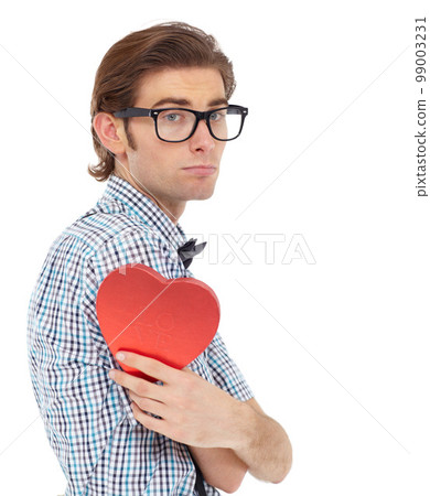 Love, depression and portrait of man with heart emoji, romance and valentines day isolated on white background. Waiting, sad geek and valentine shape chocolate box with glasses and bow tie in studio. 99003231