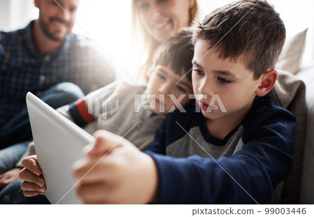 Thinking children, bonding or tablet in movies streaming, esports or social media in house living room or family home. Brothers, boys or kids on digital technology, education learning or team gaming Thinking children, bonding or tablet in movies streaming, esports or social media in house living room or family home. Brothers, boys or kids on digital technology, education learning or team gaming 99003446
