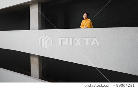 Architecture, urban building and Asian woman thinking for motivation, ideas and inspiration for engineering design. Vision, goals and female architect in industrial, creative and modern workplace 99004281