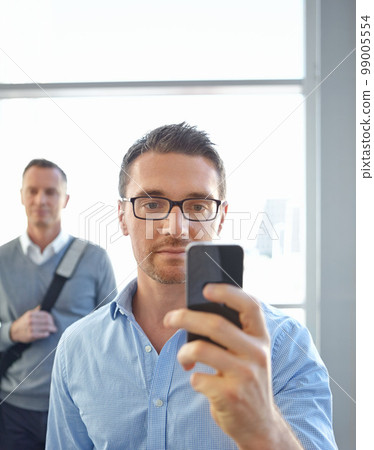 Accountant, phone or business man in Dubai airport for invest strategy, finance growth or financial review. Travel, manager or CEO on smartphone for social media, data analysis or economy research Accountant, phone or business man in Dubai airport for invest strategy, finance growth or financial review. Travel, manager or CEO on smartphone for social media, data analysis or economy research 99005554