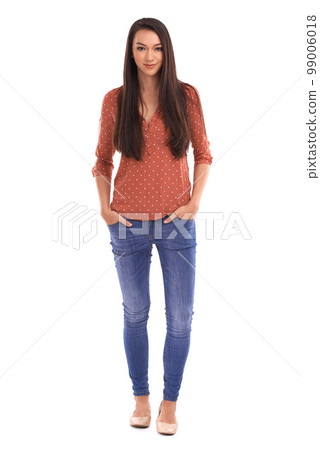 Fashion, portrait and woman with hands in pocket isolated on white background with happy confidence. Full body, beauty and weekend style, lifestyle model standing in studio with casual smile on face. 99006018