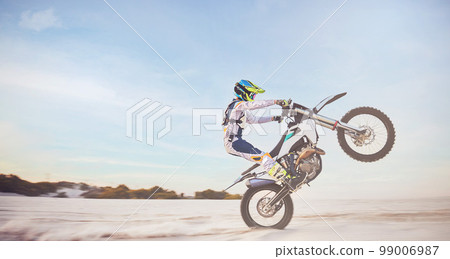 Motorbike, motorcycle athlete and desert drive with mockup cycling in nature for sport adventure. Jump, freedom and sports driving training of a man with speed on sand trail for fitness and exercise 99006987