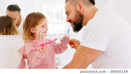 Dental health, father and girl for brushing teeth, together or laugh in bathroom in home to have fun. Oral hygiene, dad and daughter with tooth brush, being happy or bonding for happiness or in house Dental health, father and girl for brushing teeth, together or laugh in bathroom in home to have fun. Oral hygiene, dad and daughter with tooth brush, being happy or bonding for happiness or in house 99008184