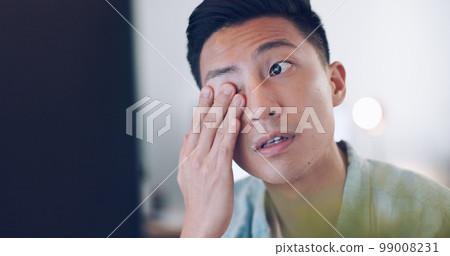 Asian businessman, tired and hand on face in communication office, headache and marketing company. Man, computer or late night reading with burnout, target or kpi at digital marketing agency in Tokyo 99008231