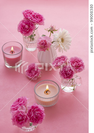 pink roses and candles 99008380