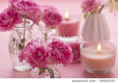 pink roses and candles pink roses and candles 99008383