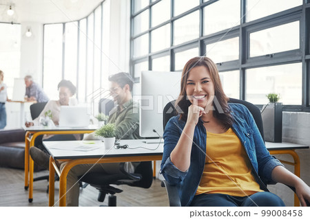 Woman, office portrait and smile by desk with business people, success and vision at web design company. Creative woman, motivation and modern office with career, goals and happy for job in New York 99008458