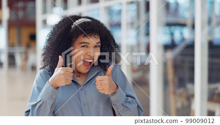 Black woman, face and smile with thumbs up for good job, okay or satisfaction for career at the office. Portrait of happy African American female creative designer smiling with thumbsup for startup Black woman, face and smile with thumbs up for good job, okay or satisfaction for career at the office. Portrait of happy African American female creative designer smiling with thumbsup for startup 99009012
