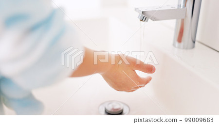 Cleaning, child and girl washing hands in the bathroom with soap for hygiene, healthcare and independence at home. Young, water and healthy kid doing sanitary routine at a sink for toxic bacteria 99009683