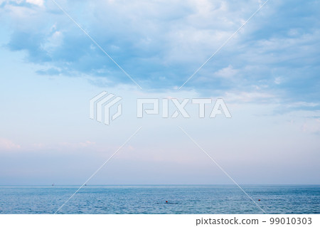 Background of sky and sea, sea is very calm with gentle ripples, sky perfectly clear. Background of sky and sea, sea is very calm with gentle ripples, sky perfectly clear. 99010303