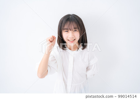 Girl Elementary school student Guts pose Bird's eye view Girl Elementary school student Guts pose Bird's eye view 99014514